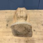 Uit hout gesneden hoofd of buste van een non
