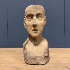 Uit hout gesneden hoofd of buste