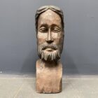 Beschilderd gesneden houten hoofd van man