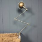Donkergrijze drie-arms Jielde tafel klemlamp