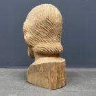 Gedetailleerd uit hout gesneden houten hoofd