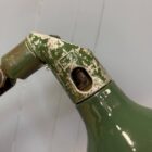 Donkergroene drie-arms Mek Elek machinelamp
