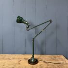 Donkergroene drie-arms Mek Elek machinelamp
