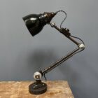 Vroeg model Rademacher tafellamp met zwart emaille kap