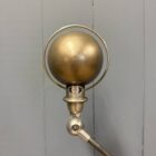 Gepolijste 5 arms Jieldé vloerlamp met zwart merk plaatje