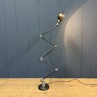 Gepolijste 5 arms Jieldé vloerlamp met zwart merk plaatje