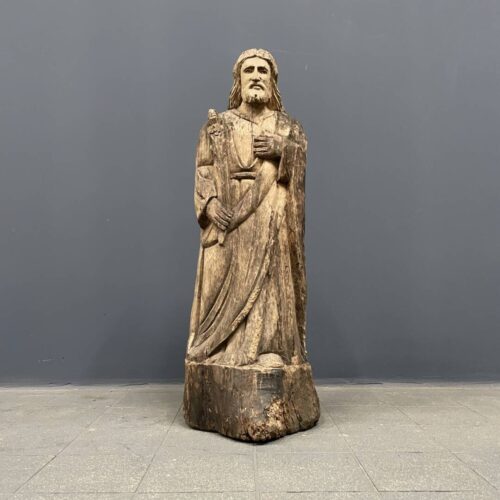 Verweerd religieus houten beeld